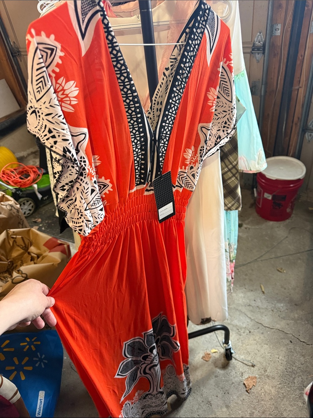 Vibrant Orange Floral Midi Dress with Black Trim